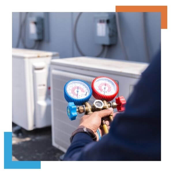 HVAC tech working on AC